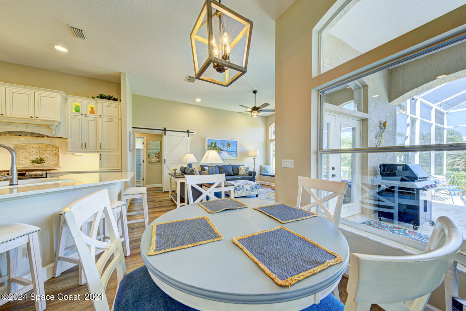 4070 Stoney Point Road Melbourne, FL 32940 - Photo 28 of 75 breakfast nook with chandelier