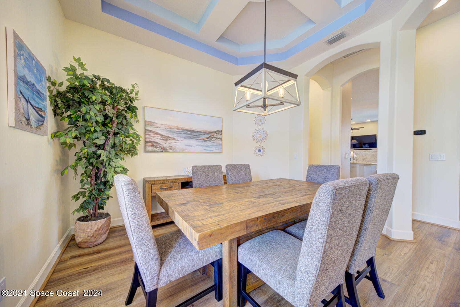 4070 Stoney Point Road Melbourne, FL 32940 - Photo 33 of 75 a view of a dining room with furniture window and wooden floor
