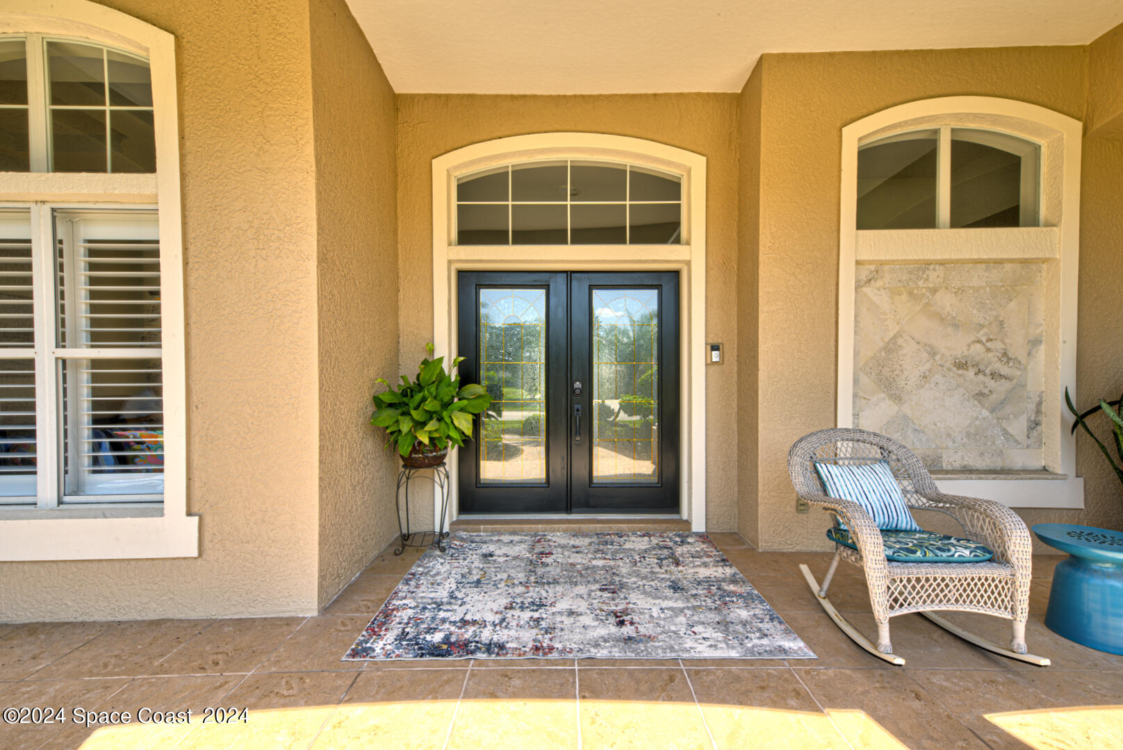 4070 Stoney Point Road Melbourne, FL 32940 - Photo 5 of 75 a front view of a house with outdoor space