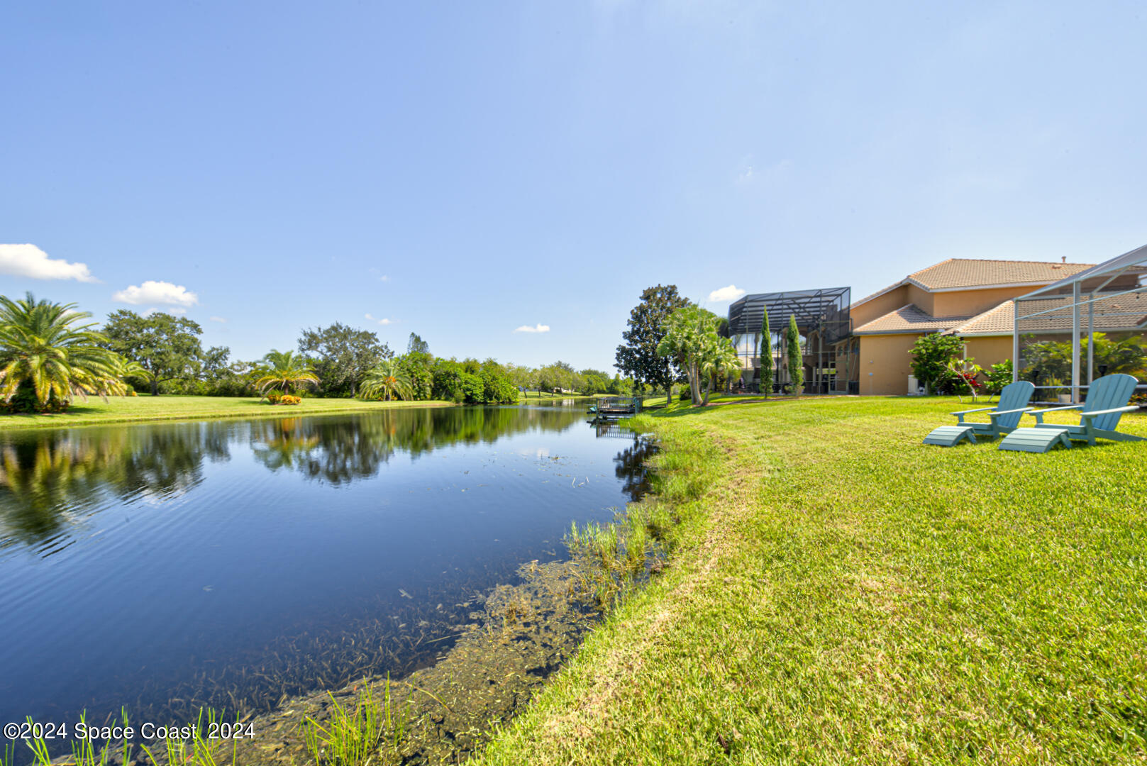 4070 Stoney Point Road Melbourne, FL 32940 - Photo 70 of 75 a view of a lake with houses in the back