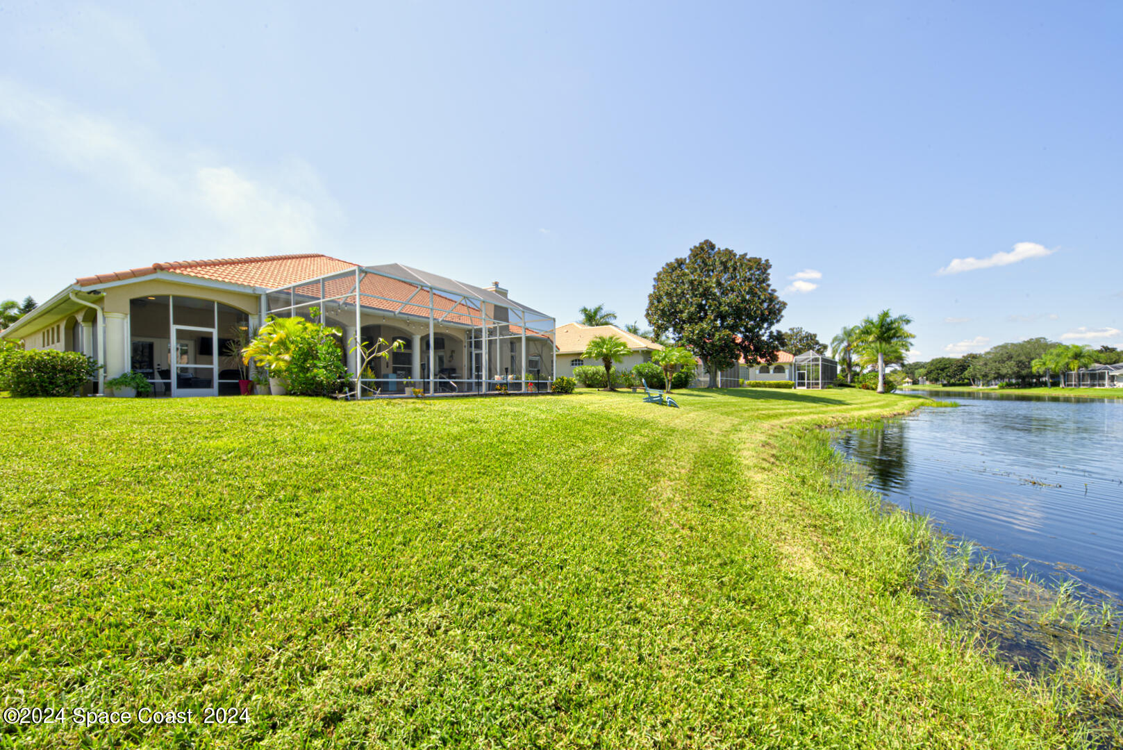 4070 Stoney Point Road Melbourne, FL 32940 - Photo 72 of 75 a view of a house with a yard and sitting area