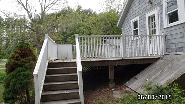 417 County Road Rochester, MA 02576 - Photo 8 of 11 a view of a roof deck with wooden fence and floor
