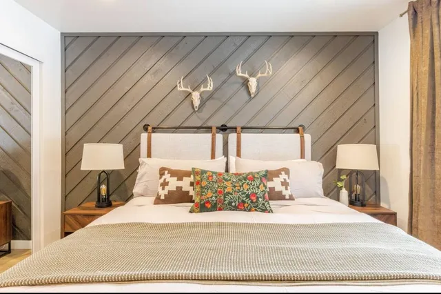 a bathroom with bathtub and shower