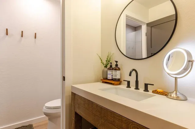 a bed room with a bed and a night lamp