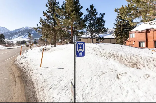 a view of a house with brick walls