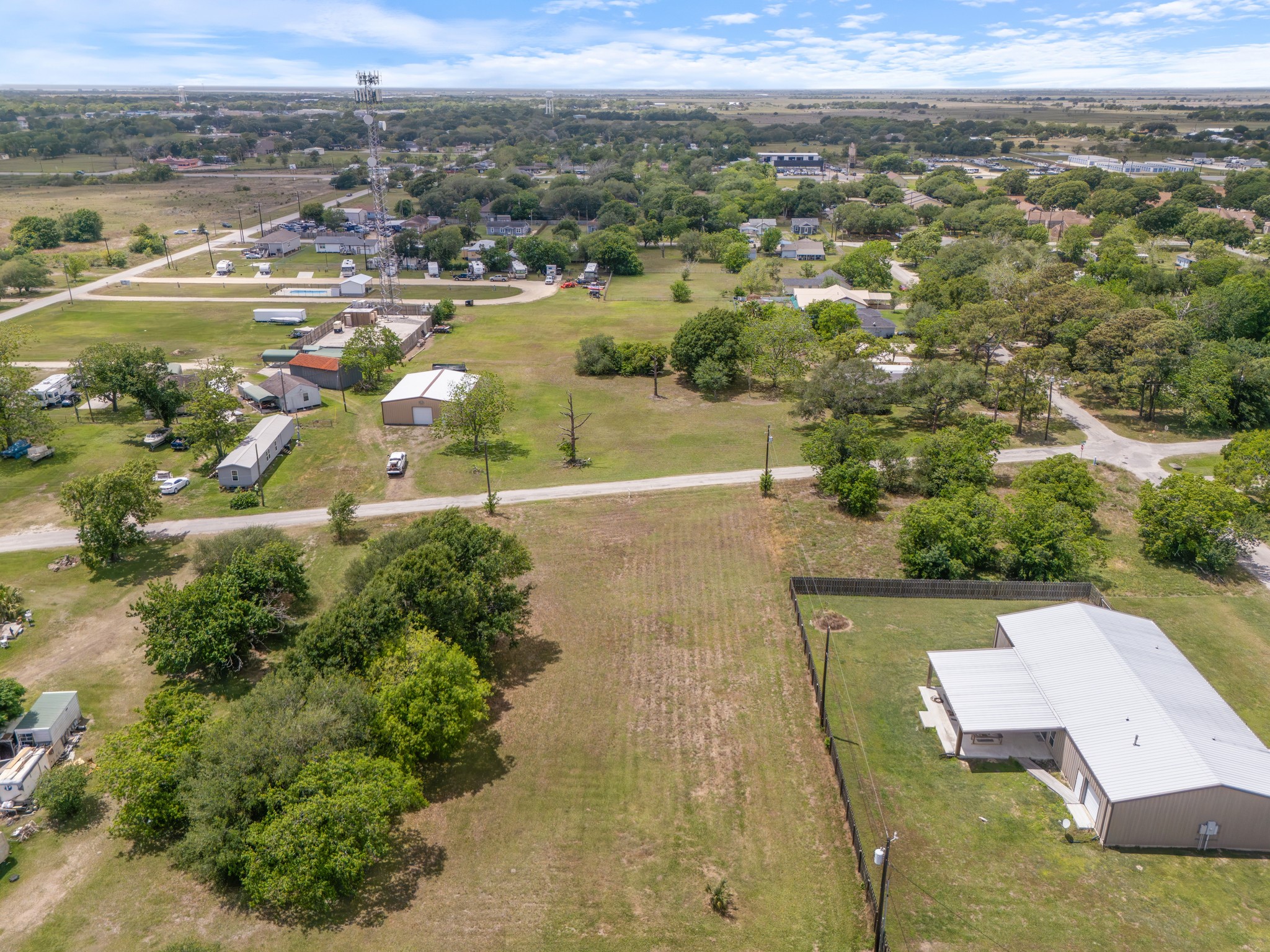 1714 Ruthven Street Palacios, TX 77465 - Photo 5 of 11 an aerial view of a house with a yard