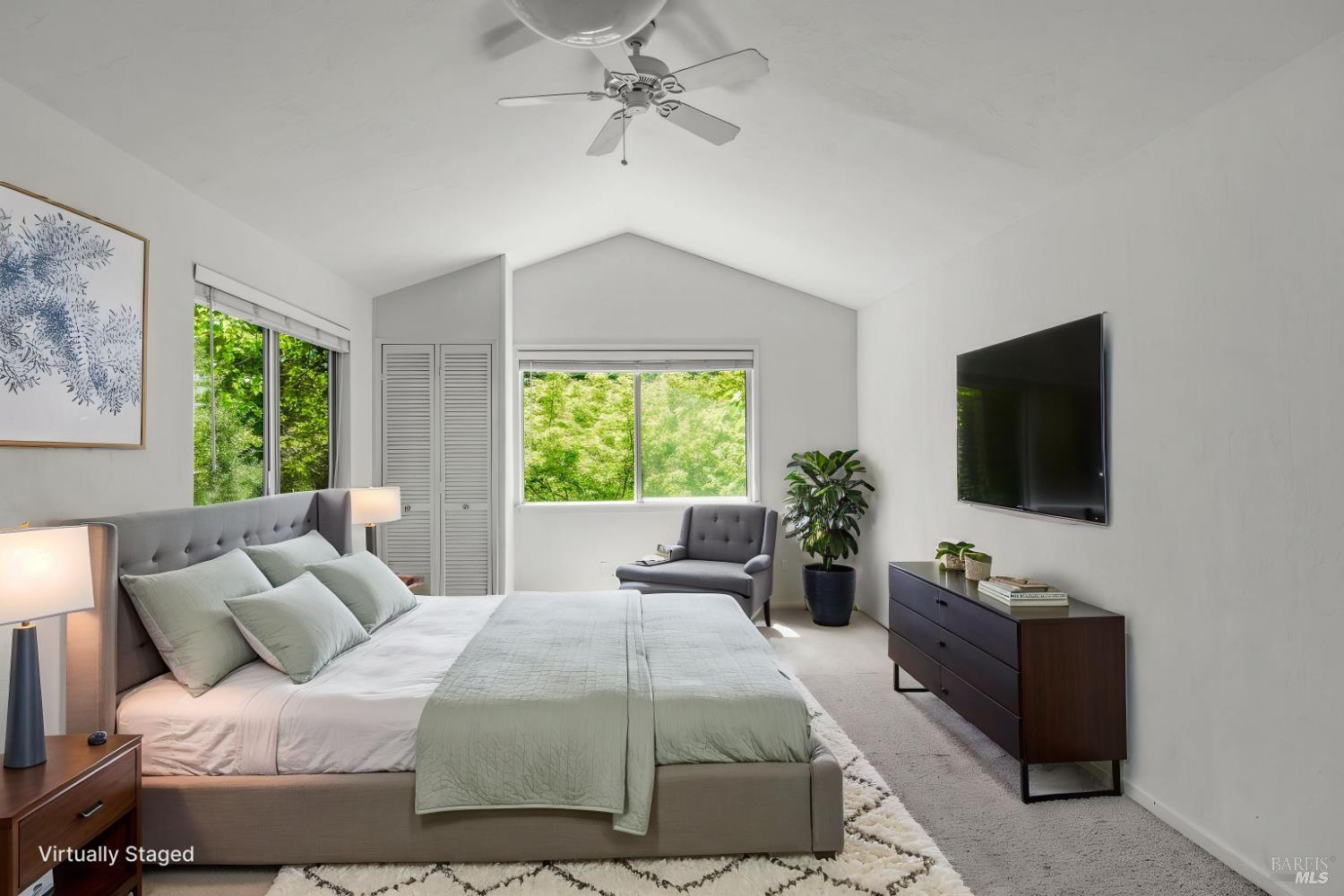 625-629 Hill Road Angwin, CA 94508 - Photo 34 of 64 a bedroom with a bed and a flat screen tv