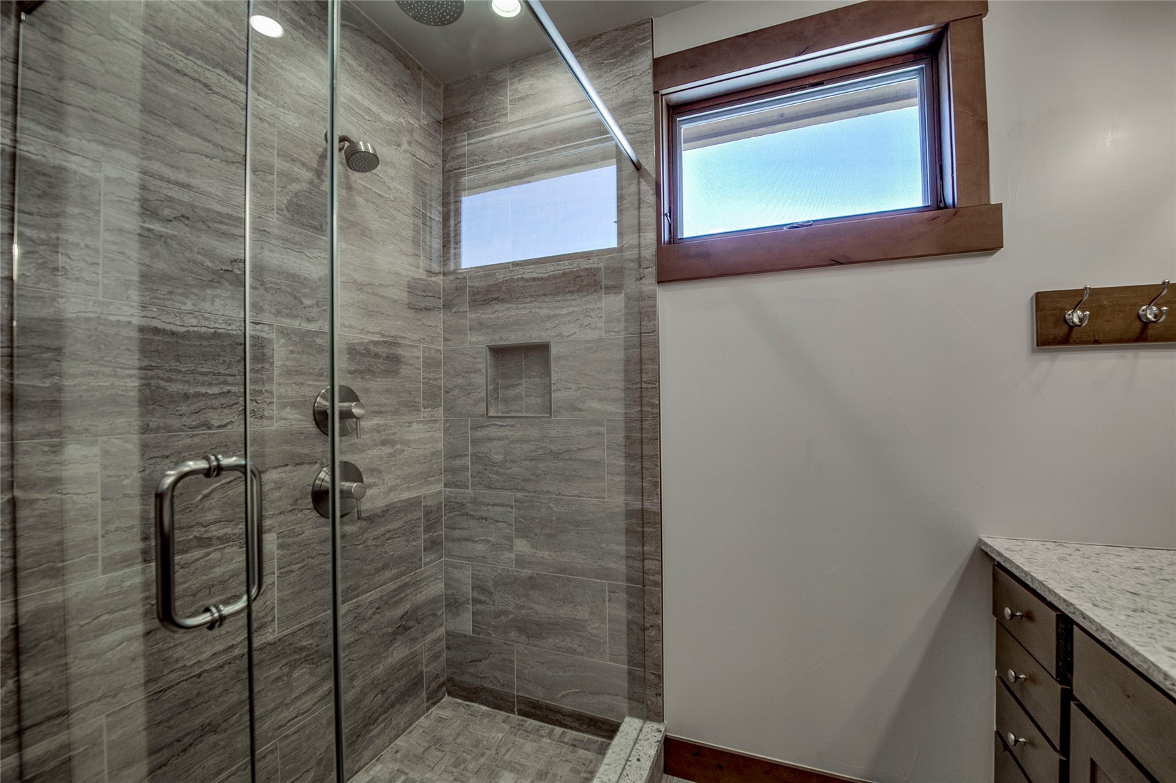 307 Maryland Creek Road Silverthorne, CO 80498 - Photo 15 of 47 Bathroom with double vanity and a tiled shower