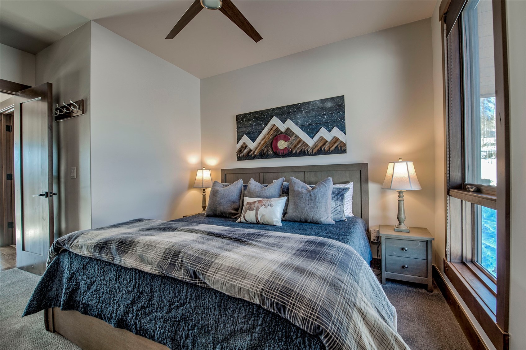 307 Maryland Creek Road Silverthorne, CO 80498 - Photo 19 of 47 Bedroom featuring carpet flooring and ceiling fan