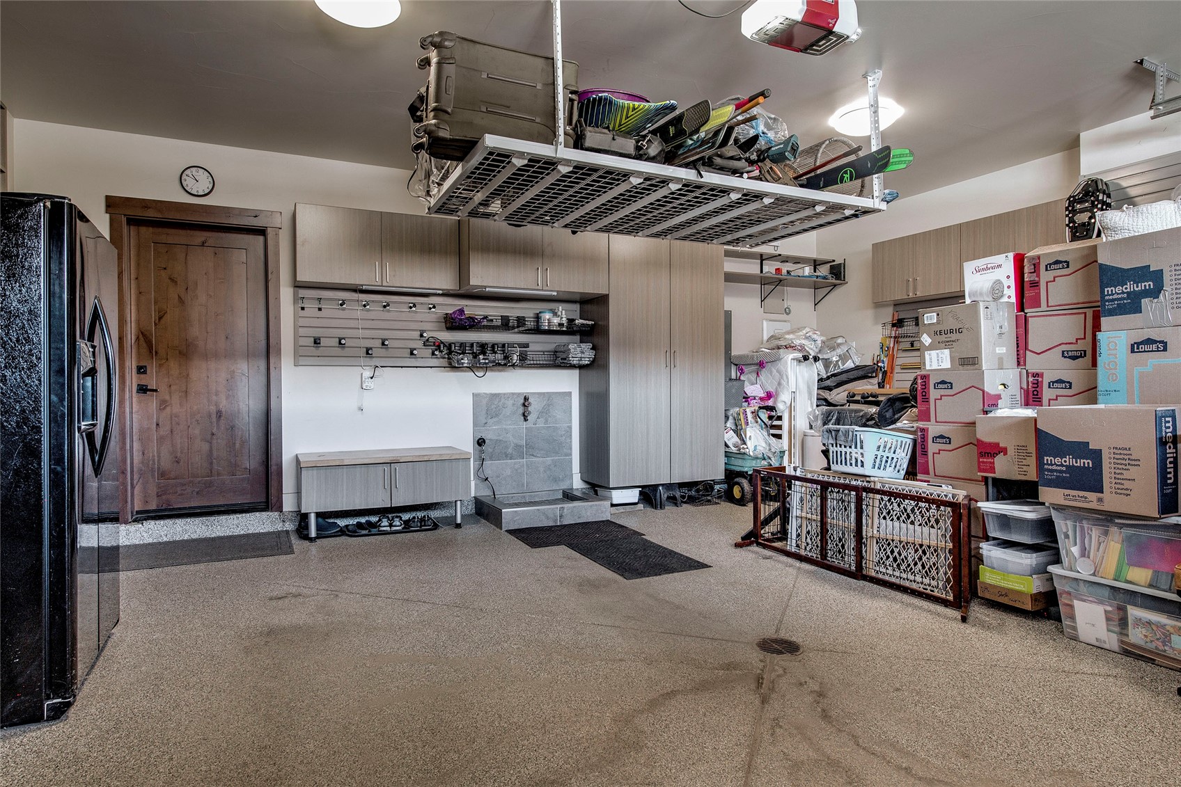 307 Maryland Creek Road Silverthorne, CO 80498 - Photo 30 of 47 Garage with epoxy floors, cabinet space, and dog wash.