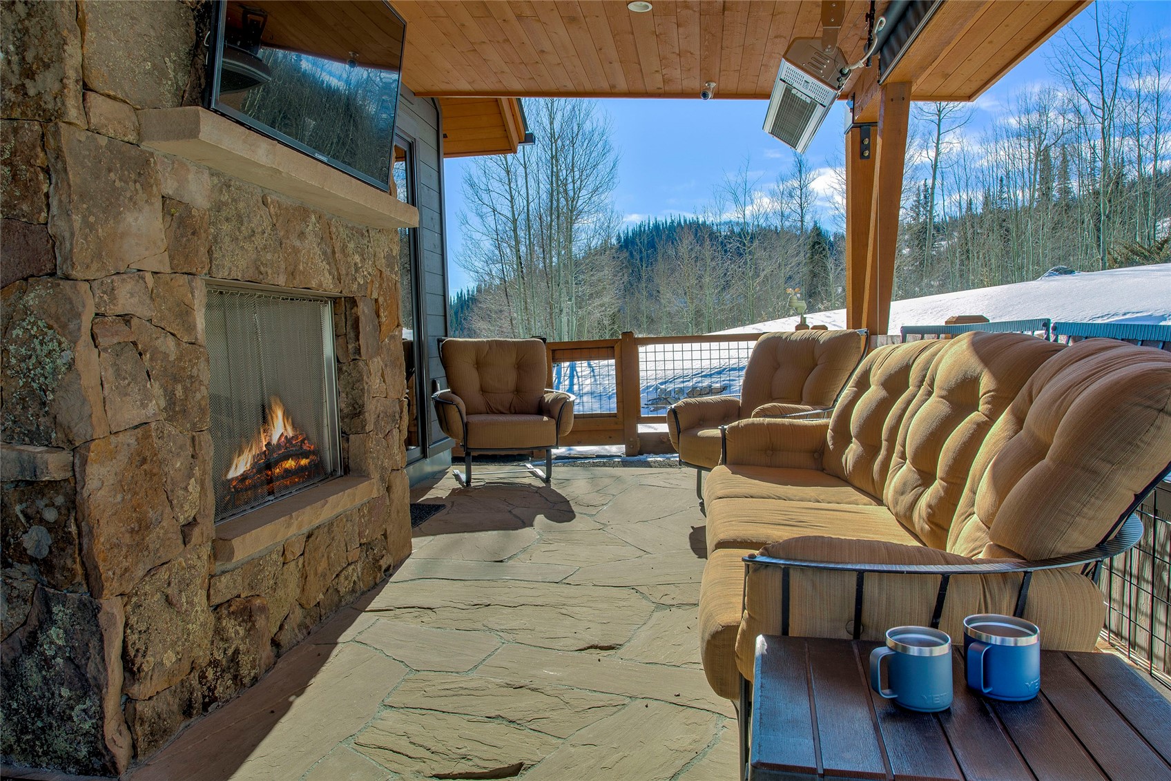 307 Maryland Creek Road Silverthorne, CO 80498 - Photo 32 of 47 View of patio featuring an outdoor living space with a fireplace