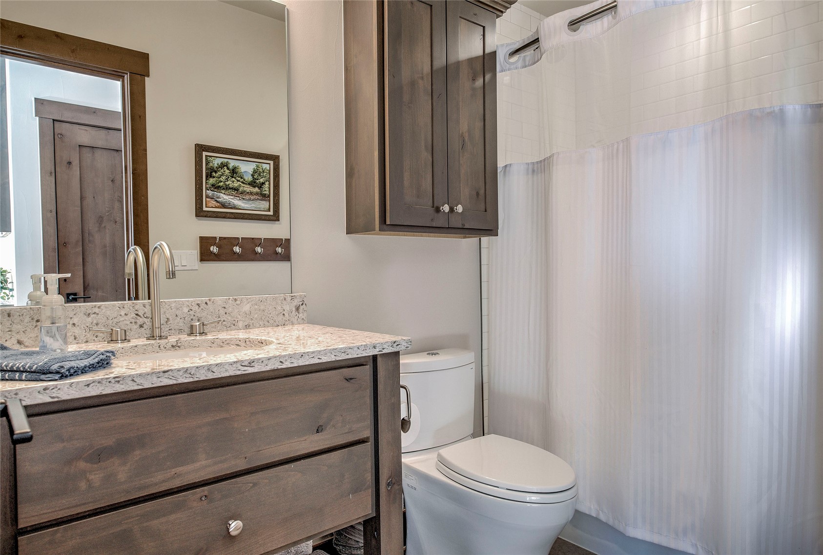 307 Maryland Creek Road Silverthorne, CO 80498 - Photo 10 of 47 Bathroom featuring vanity and tiled shower Surround.