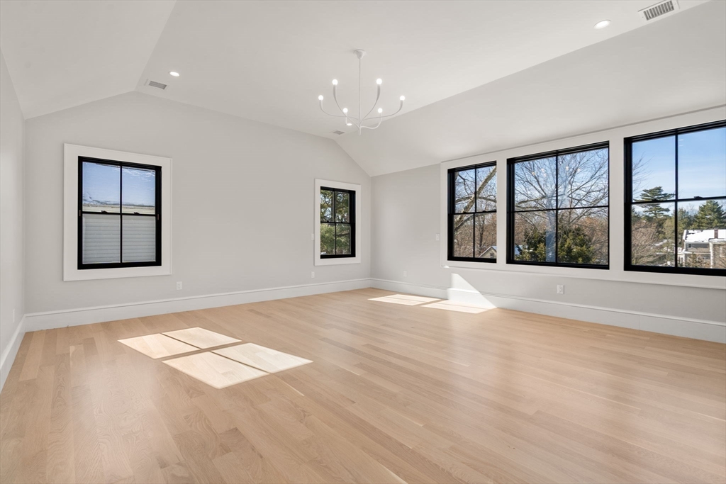 577 Grove Street Newton, MA 02462 - Photo 12 of 29 a view of an empty room and window