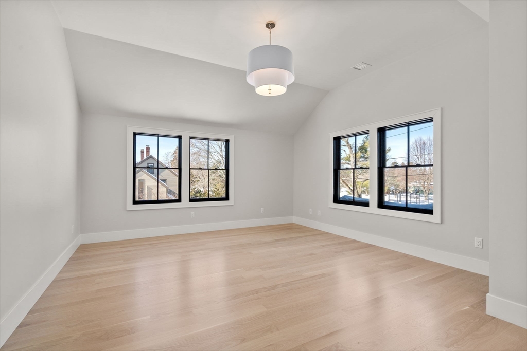 577 Grove Street Newton, MA 02462 - Photo 20 of 29 a view of an empty room with a window