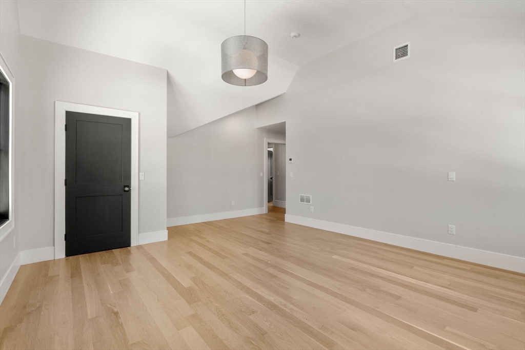 577 Grove Street Newton, MA 02462 - Photo 24 of 29 a view of empty room with wooden floor