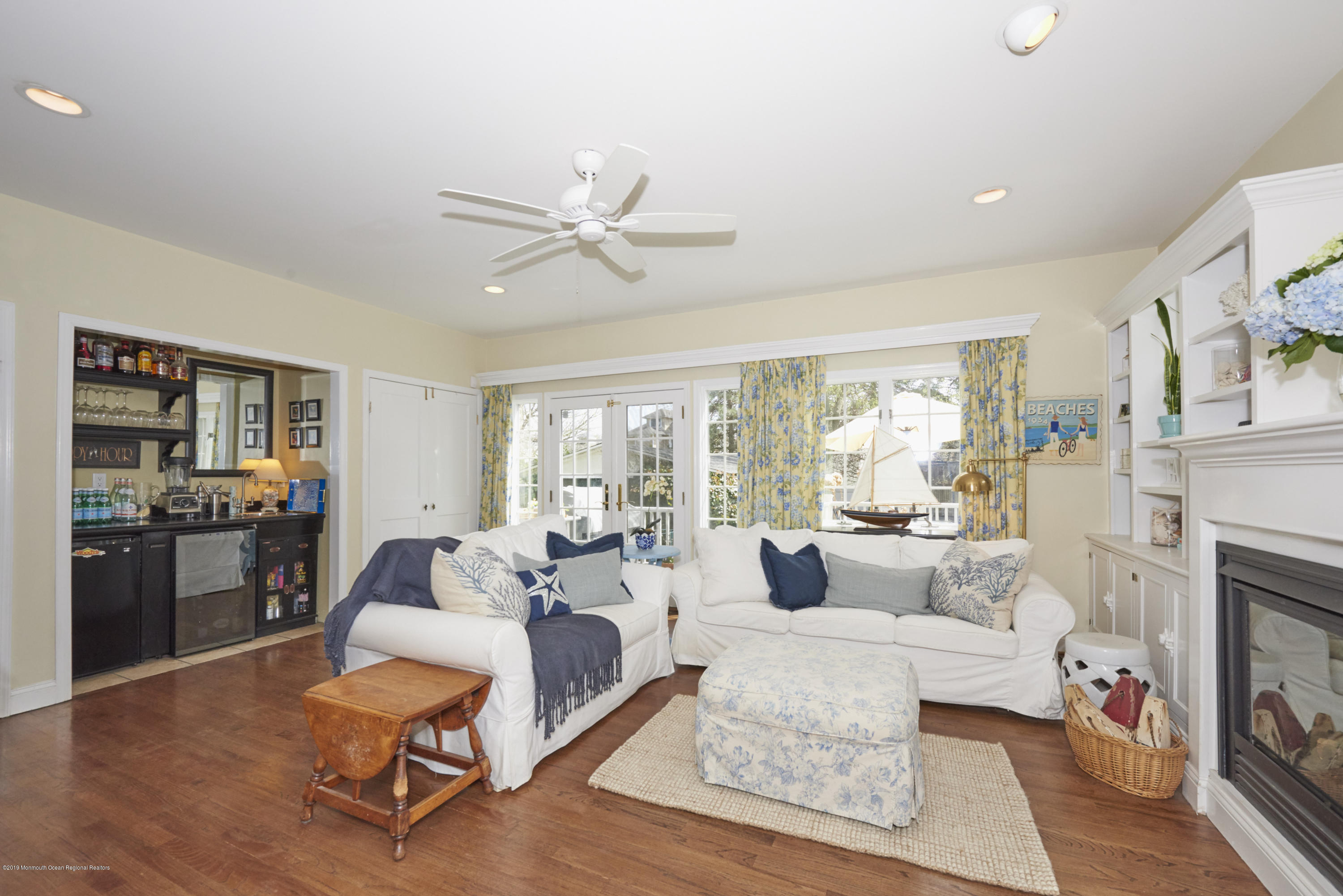 117 Black Point Road Rumson, NJ 07760 - Photo 16 of 34 a living room with furniture and a fireplace