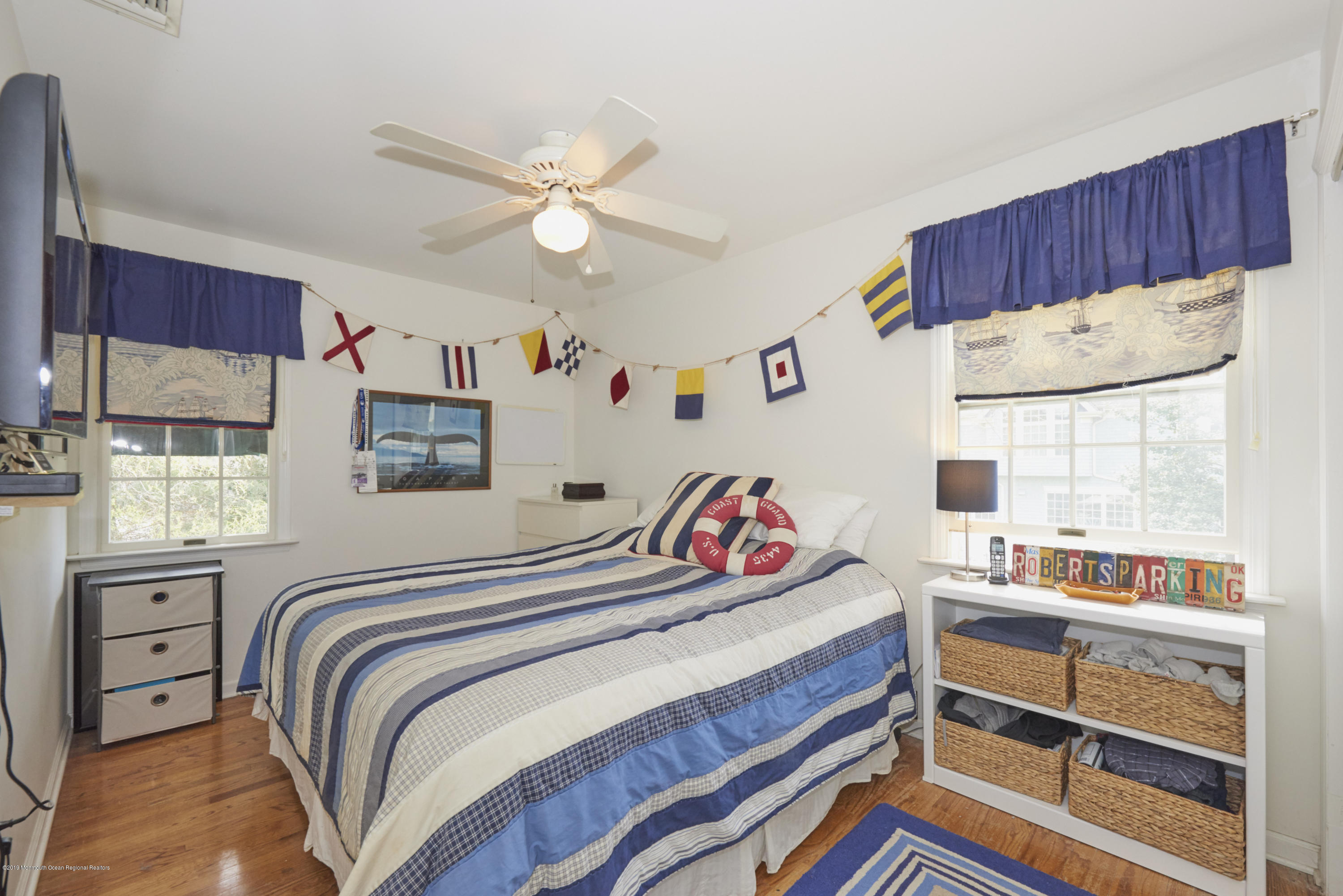 117 Black Point Road Rumson, NJ 07760 - Photo 27 of 34 a bedroom with a bed and a window