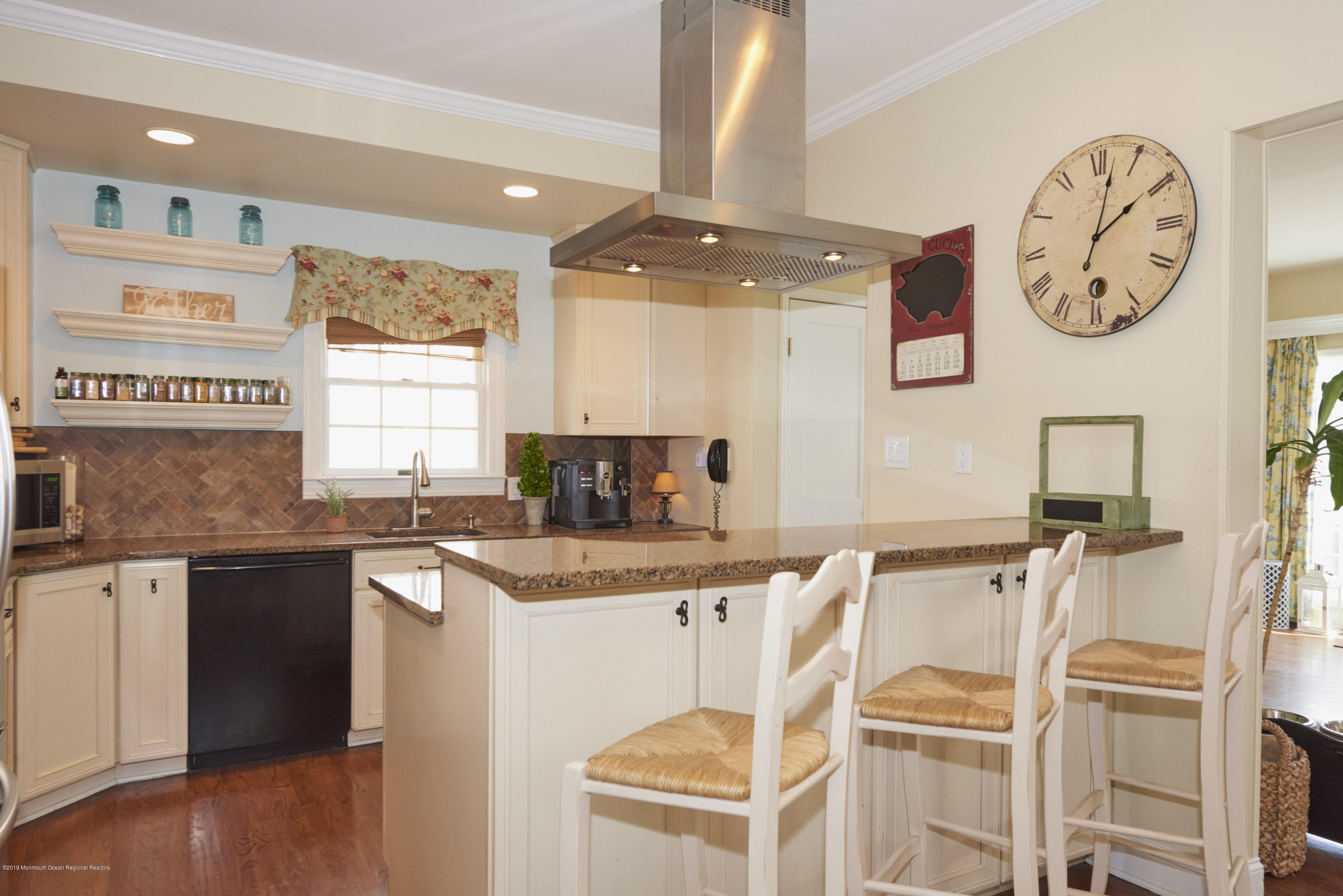 117 Black Point Road Rumson, NJ 07760 - Photo 10 of 34 a kitchen with a table and chairs
