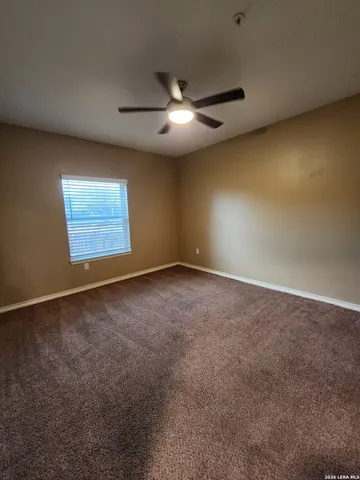 an empty room with a empty space and a window