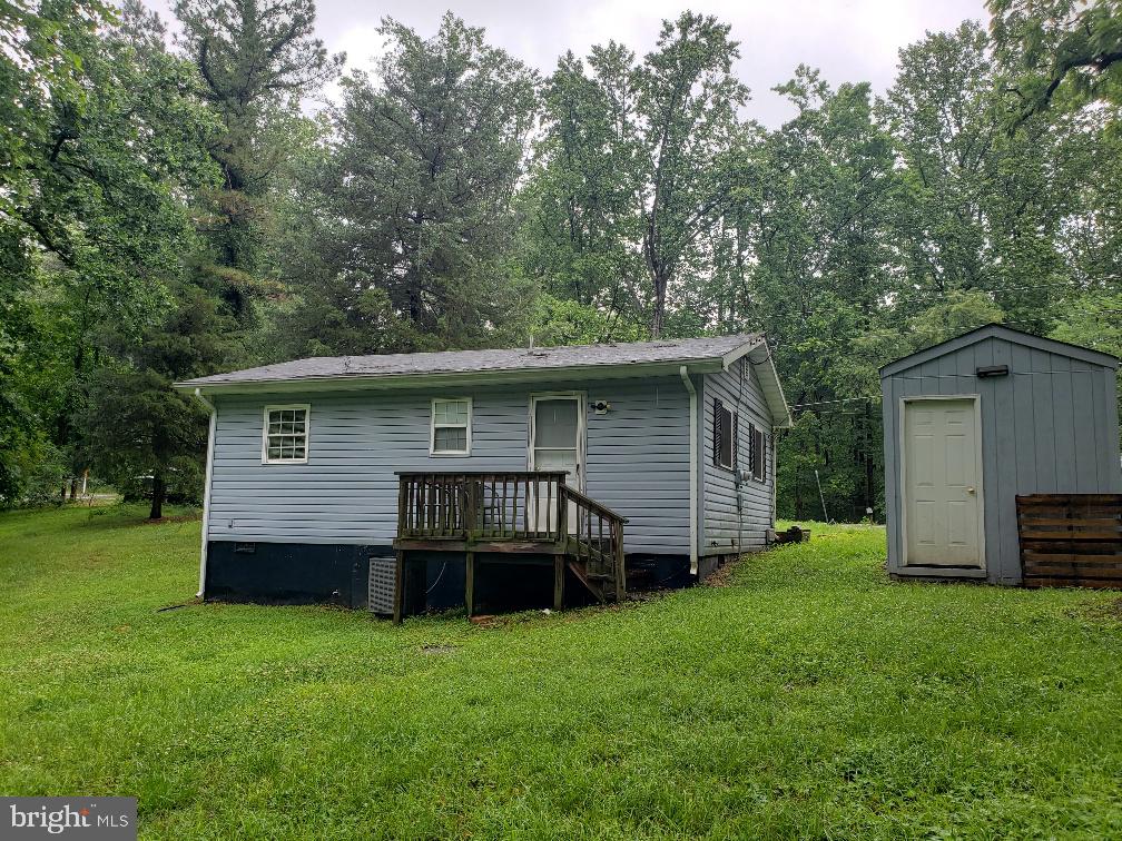 6302 Caledon Road King George, VA 22485 - Photo 13 of 13 Large backyard with shed