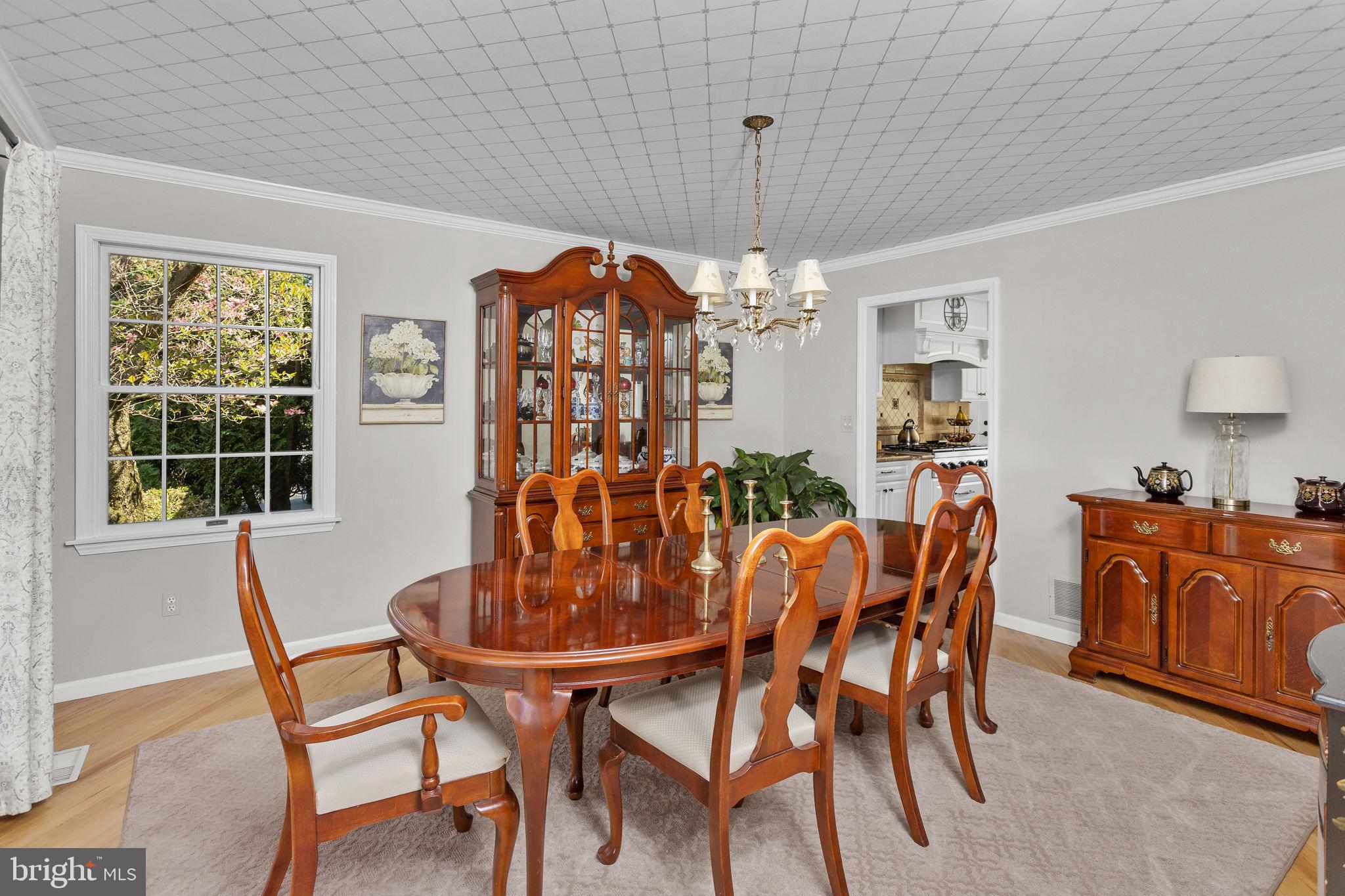 44 Walters Road Robbinsville, NJ 08691 - Photo 24 of 68 a dining room with furniture a chandelier and window