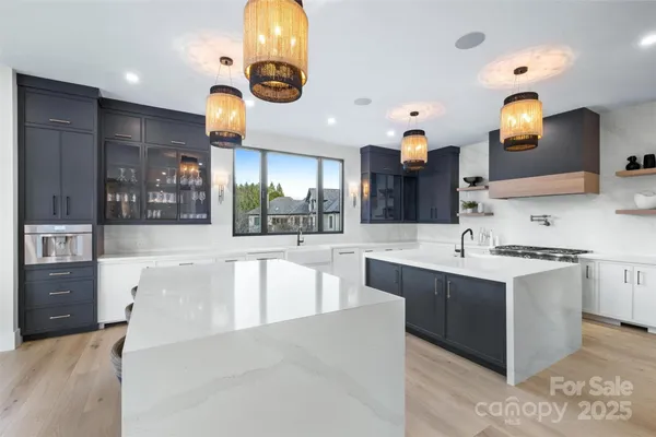 a large bathroom with a large tub and sink