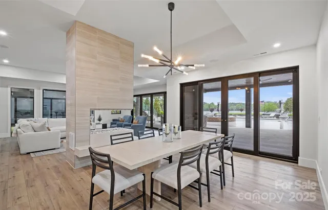 a view of a house with backyard and porch
