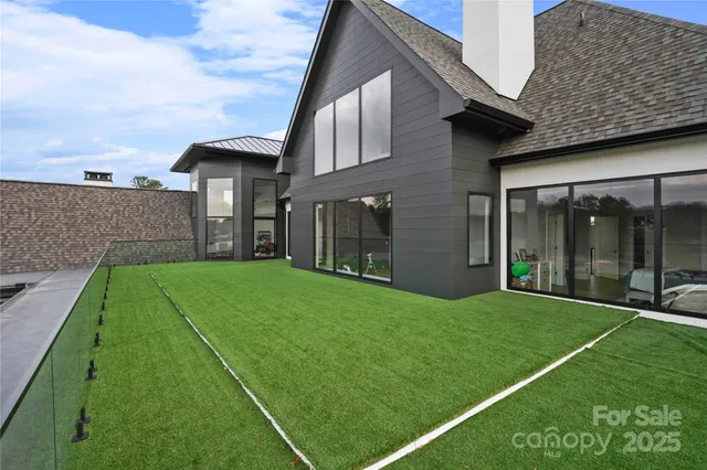 a view of a lake with a big yard