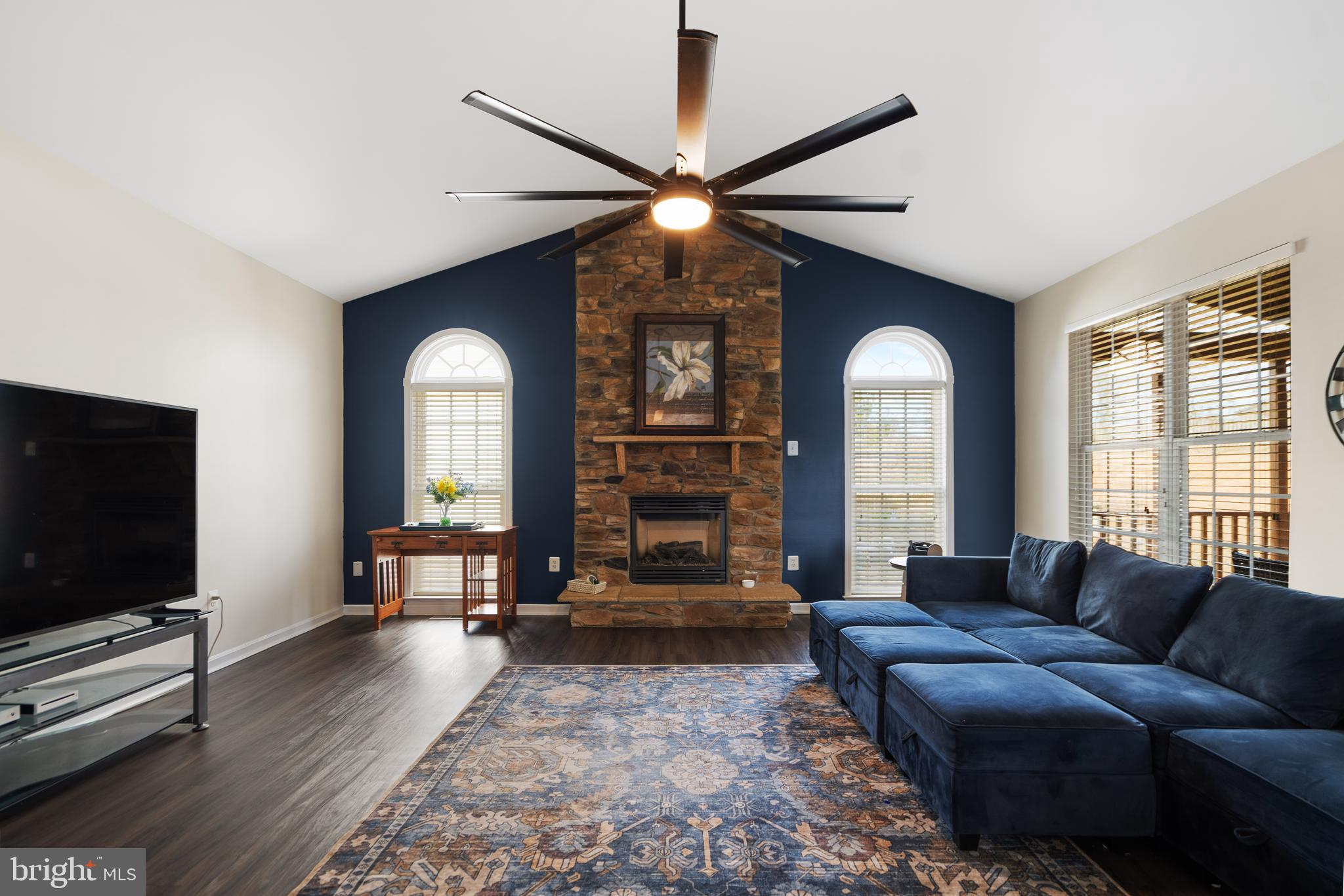 471 Blossom Tree Road Culpeper, VA 22701 - Photo 12 of 26 a living room with furniture and a flat screen tv