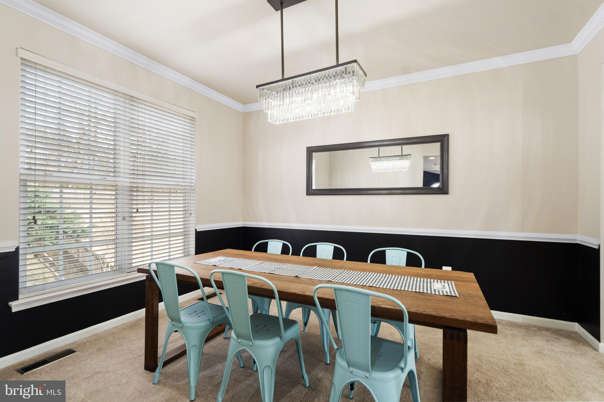 471 Blossom Tree Road Culpeper, VA 22701 - Photo 3 of 26 a view of a dining room with furniture window and wooden floor