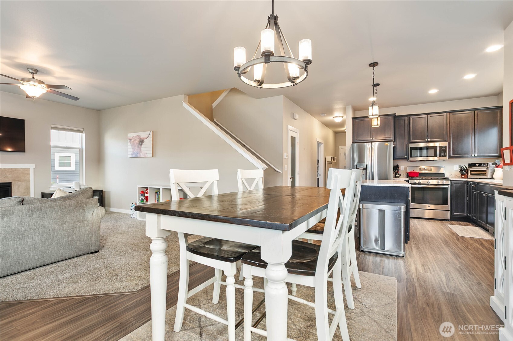 1970 North Prairie Lane Lynden, WA 98264 - Photo 11 of 40 a living room with kitchen island furniture and a chandelier