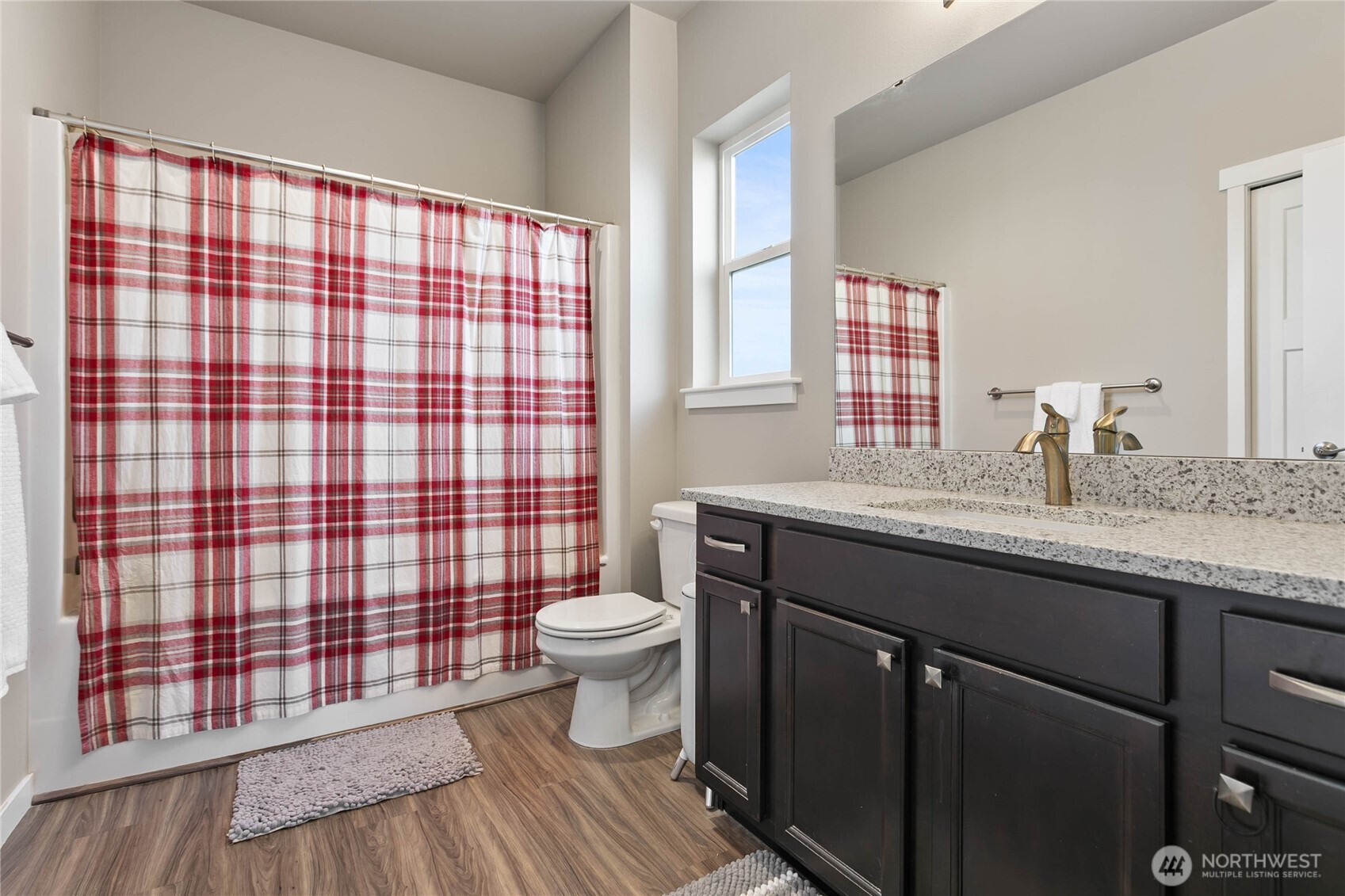 1970 North Prairie Lane Lynden, WA 98264 - Photo 25 of 40 a bathroom with a sink toilet a mirror and shower