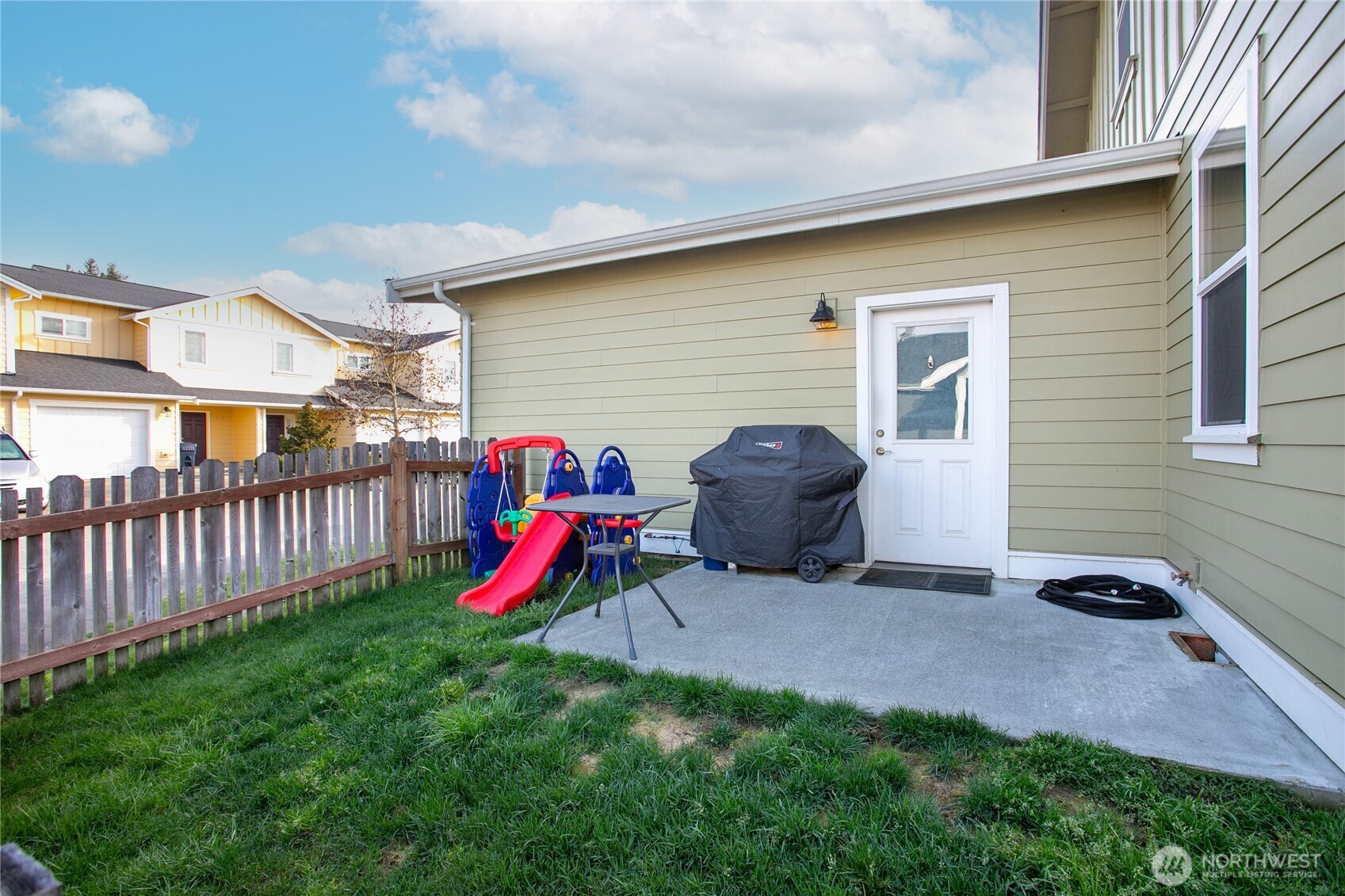 1970 North Prairie Lane Lynden, WA 98264 - Photo 34 of 40 a view of a backyard with a table and chairs
