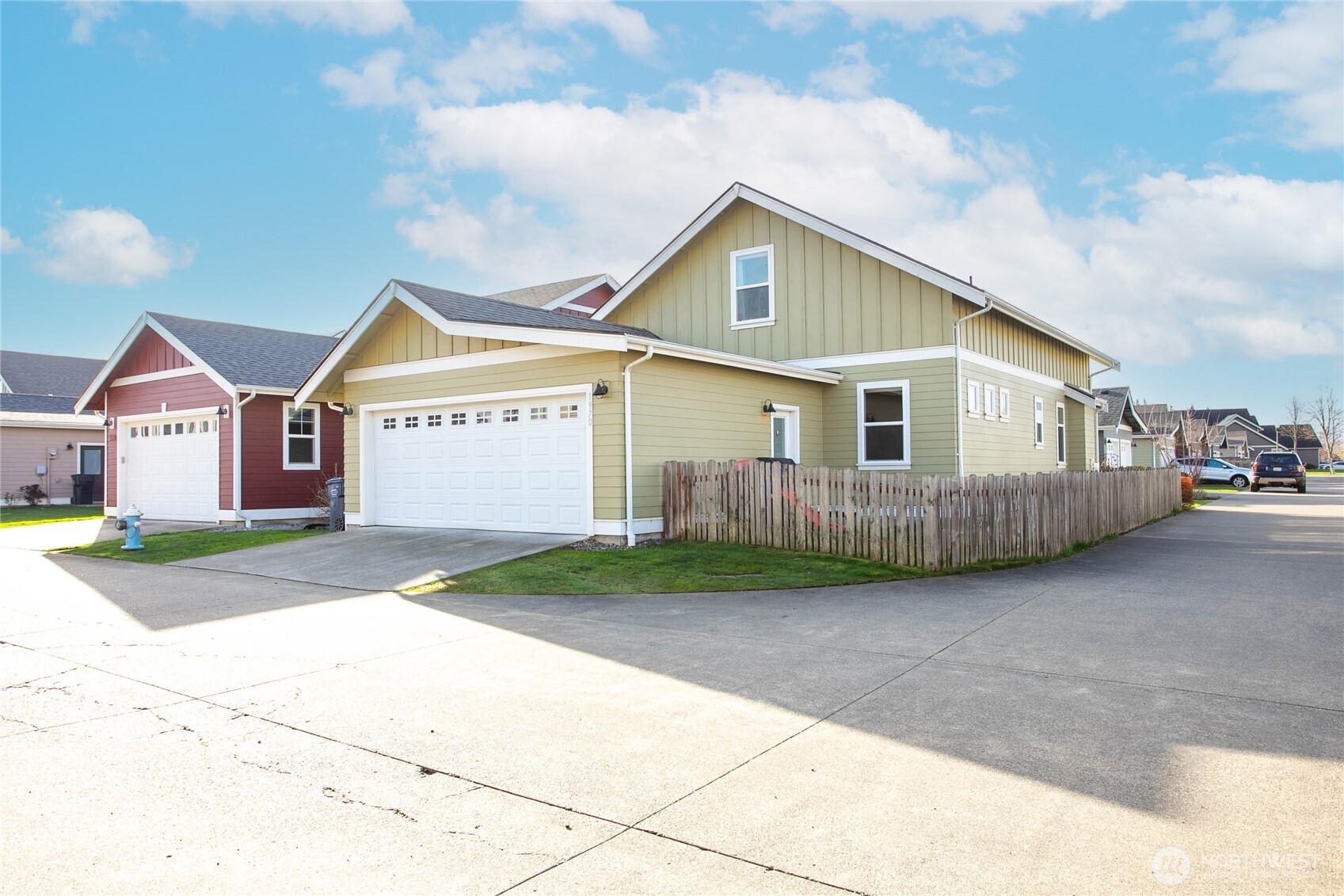 1970 North Prairie Lane Lynden, WA 98264 - Photo 36 of 40 a view of a house with wooden fence next to a road