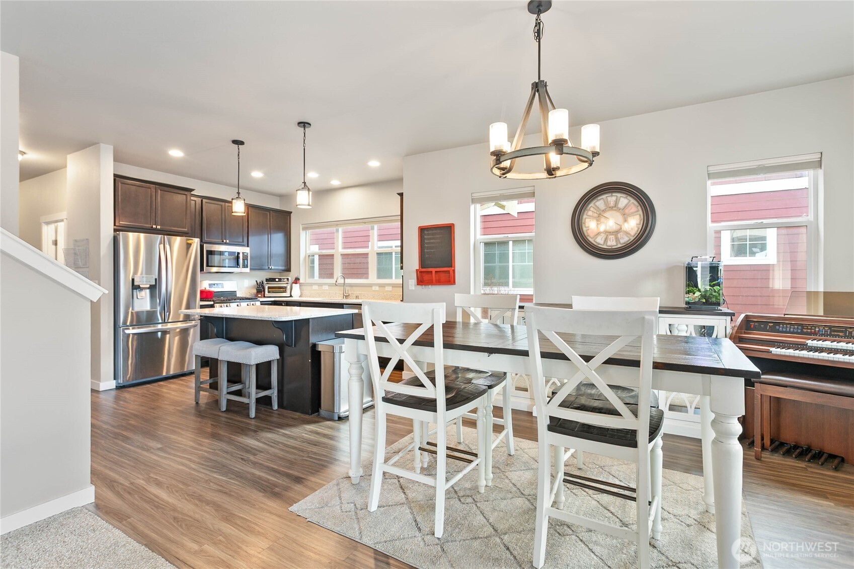 1970 North Prairie Lane Lynden, WA 98264 - Photo 8 of 40 a view of a dining area with furniture a chandelier and wooden floor