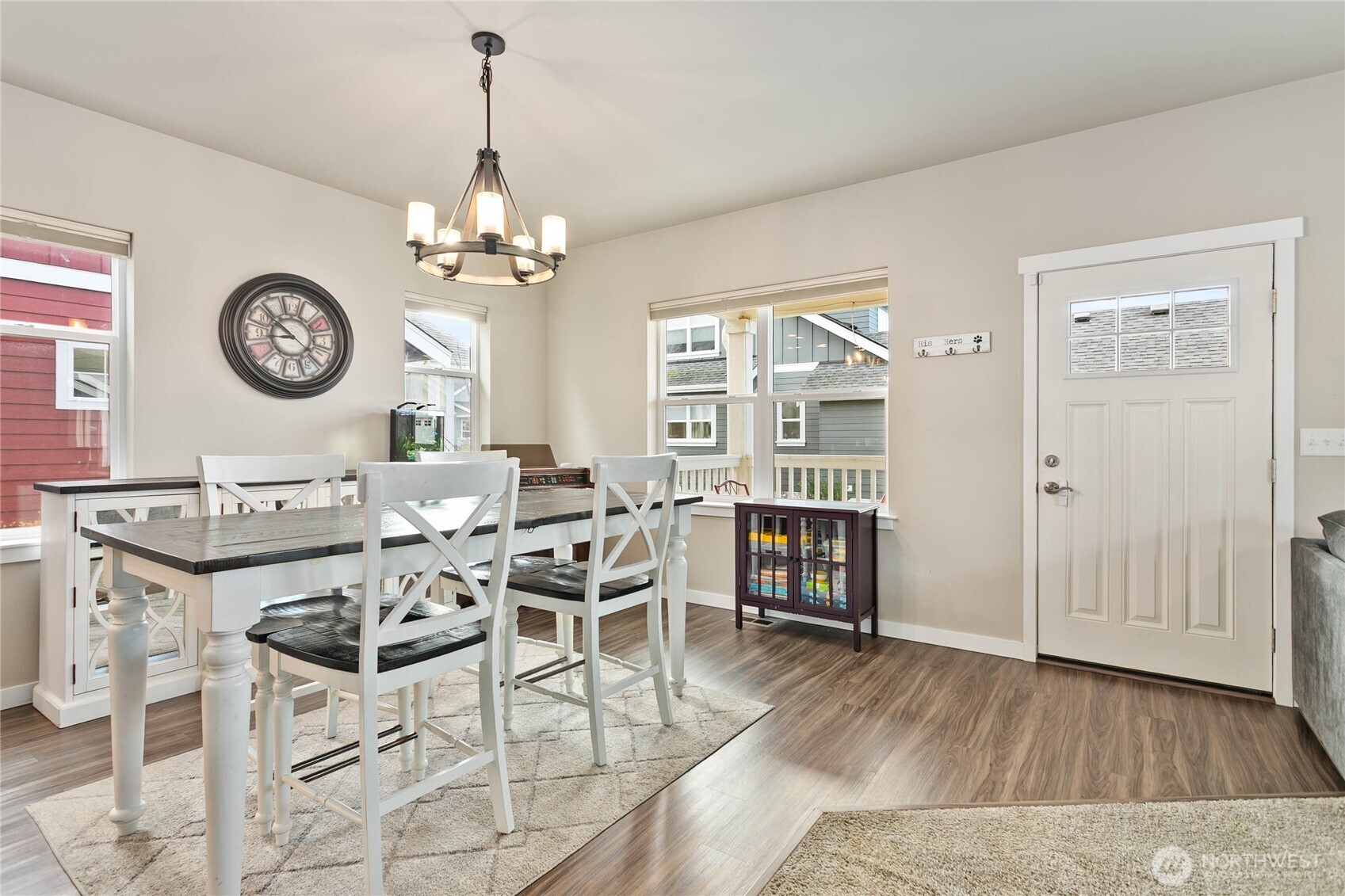 1970 North Prairie Lane Lynden, WA 98264 - Photo 9 of 40 a view of a dining room with furniture wooden floor and a clock