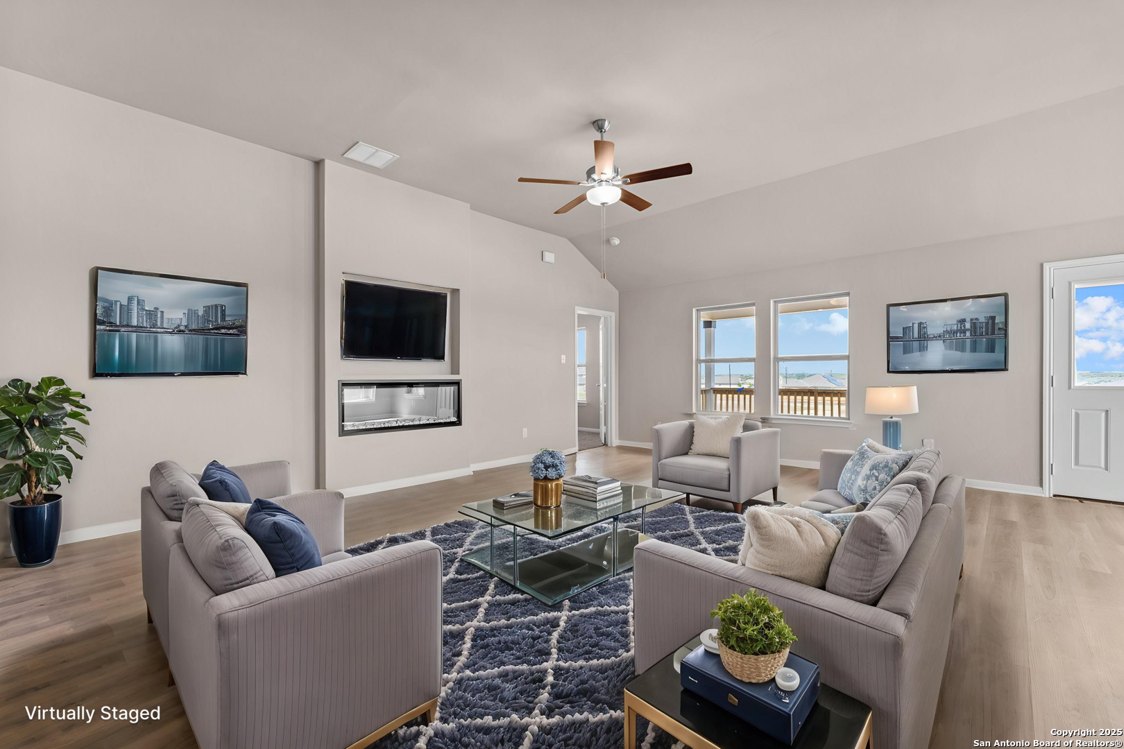 1108 Limestone Ridge Seguin, TX 78155 - Photo 5 of 17 a living room with furniture a window and a flat screen tv