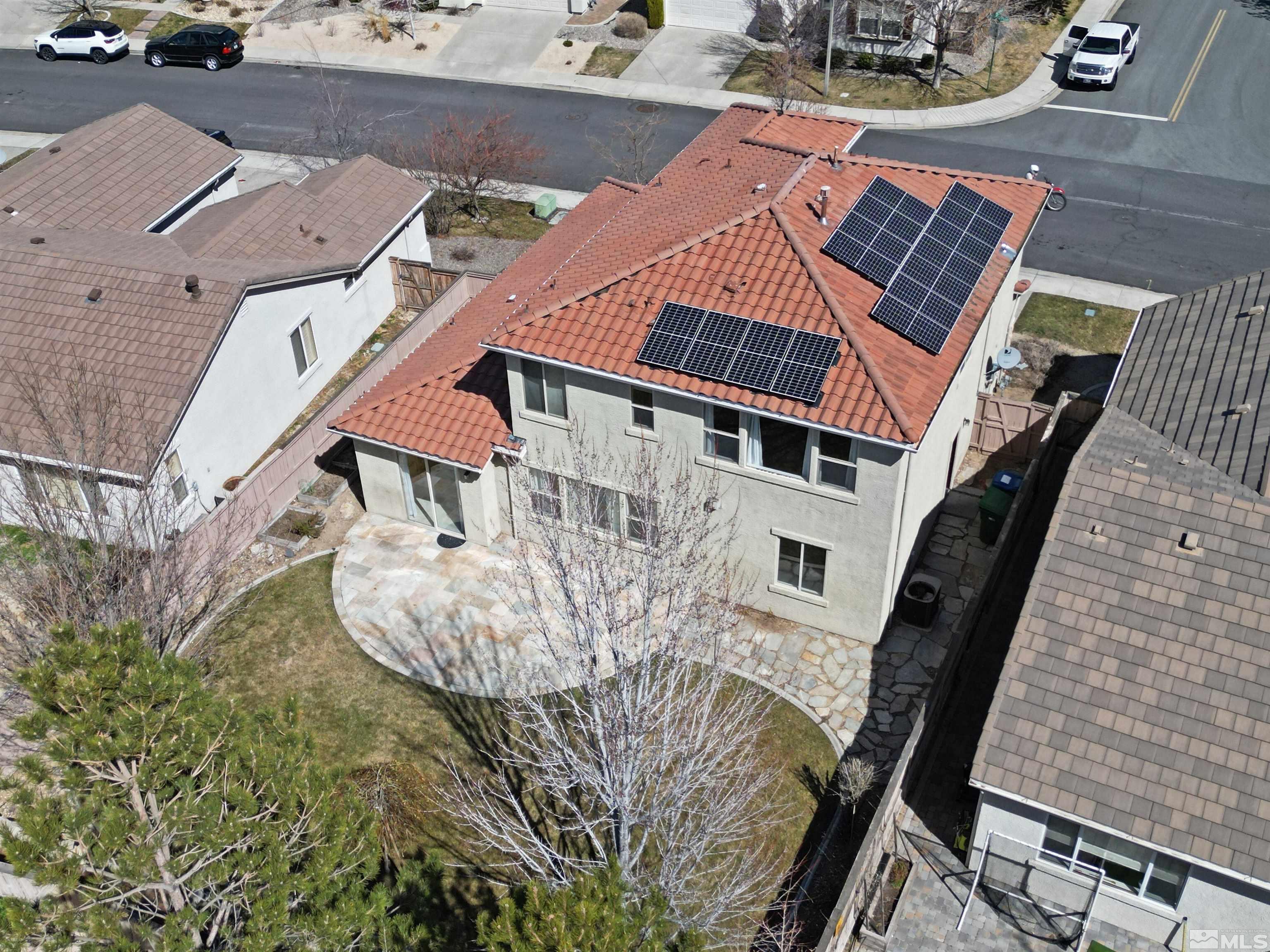 10620 Fire Poppy Circle Reno, NV 89521 - Photo 3 of 25 an aerial view of a house with backyard and deck