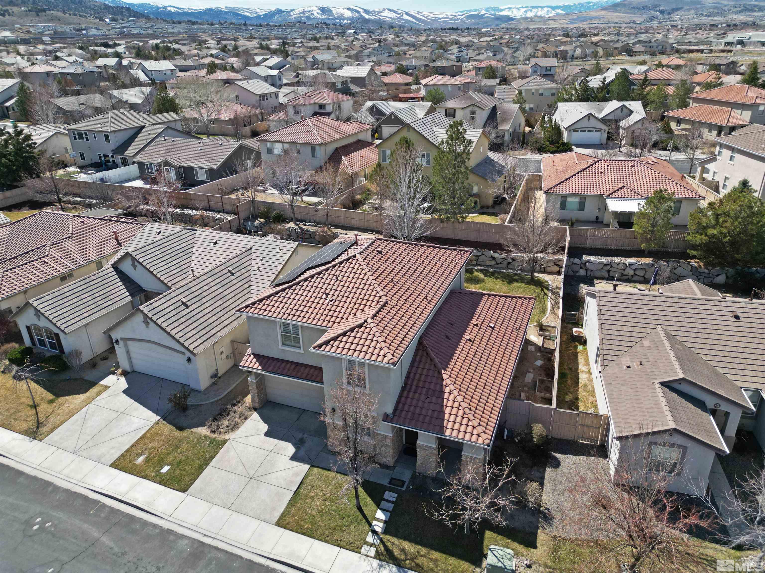 10620 Fire Poppy Circle Reno, NV 89521 - Photo 4 of 25 an aerial view of a house with a yard