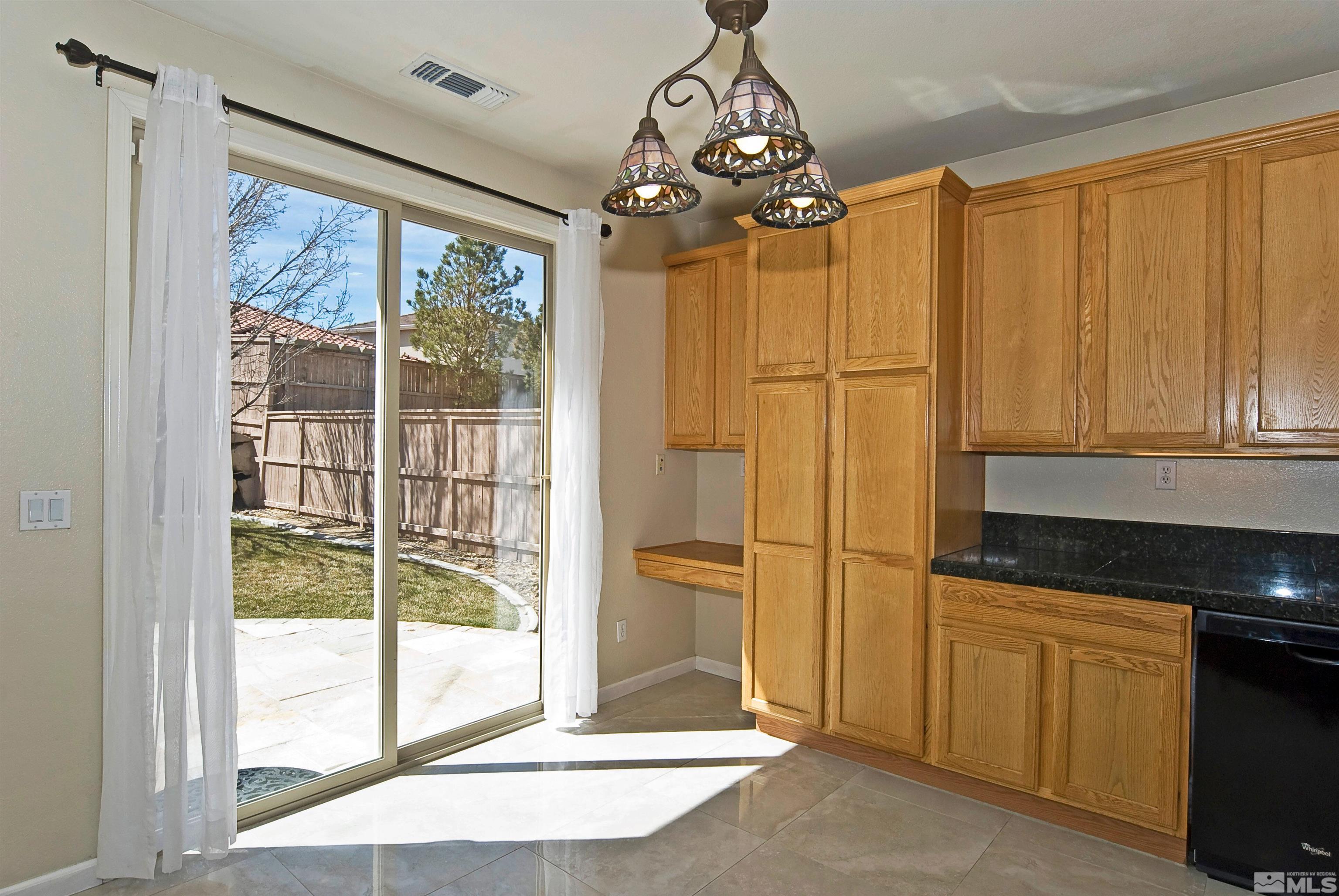 10620 Fire Poppy Circle Reno, NV 89521 - Photo 9 of 25 a very nice looking kitchen with a large window