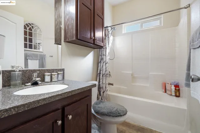 a bedroom with a bed and furniture