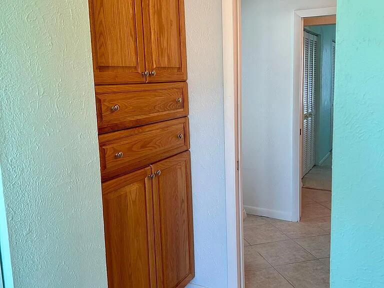 802 Shorewinds Drive, Unit C Fort Pierce, FL 34949 - Photo 8 of 9 a view of walk in closet
