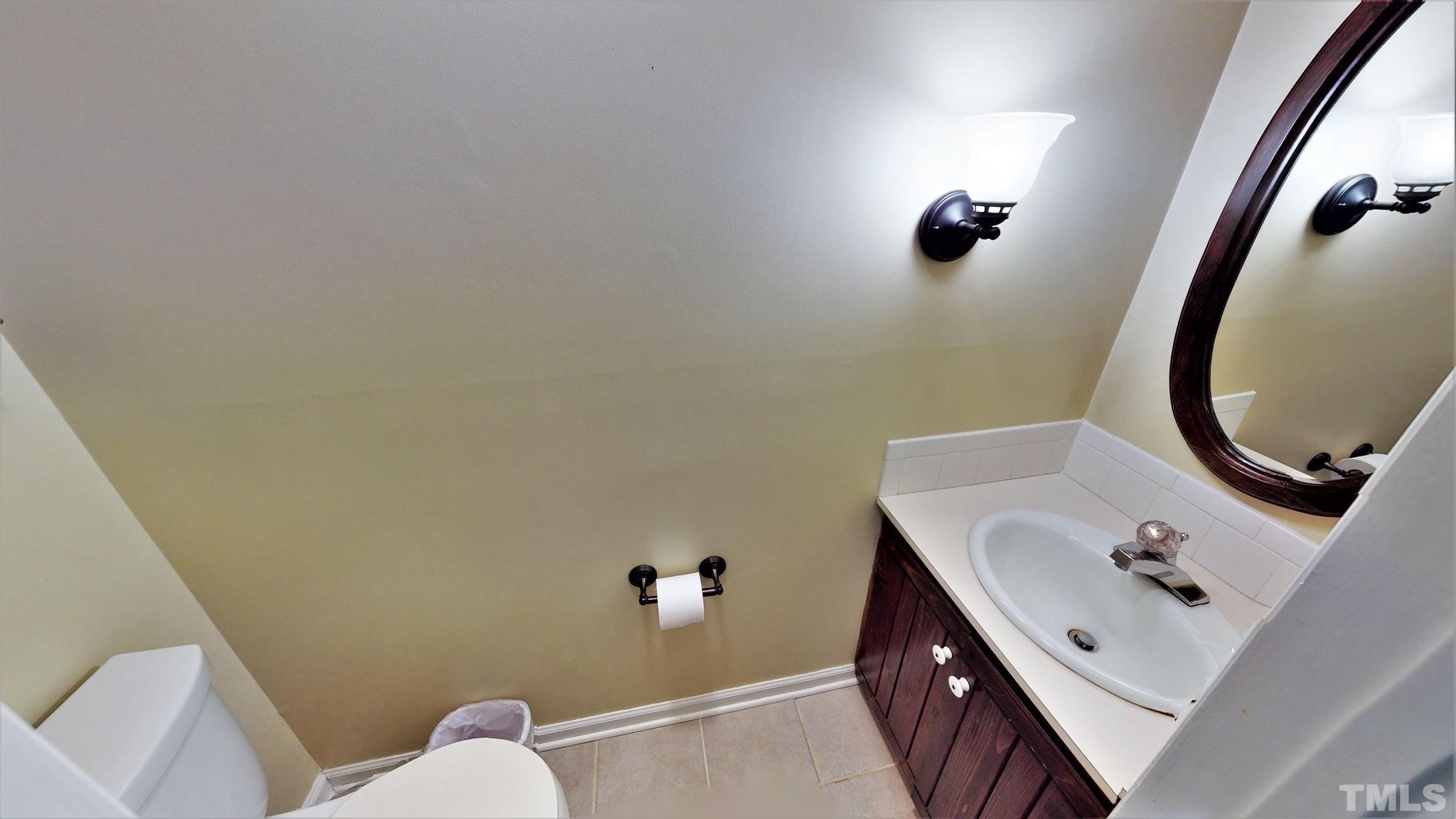 1496 Kerner Road Kernersville, NC 27284 - Photo 21 of 82 a bathroom with a sink and mirror