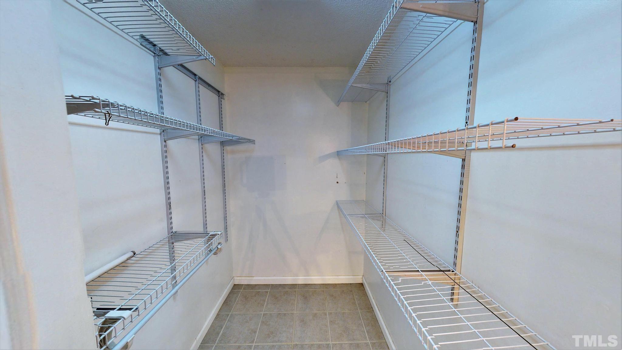 1496 Kerner Road Kernersville, NC 27284 - Photo 30 of 82 a view of an empty walk in closet