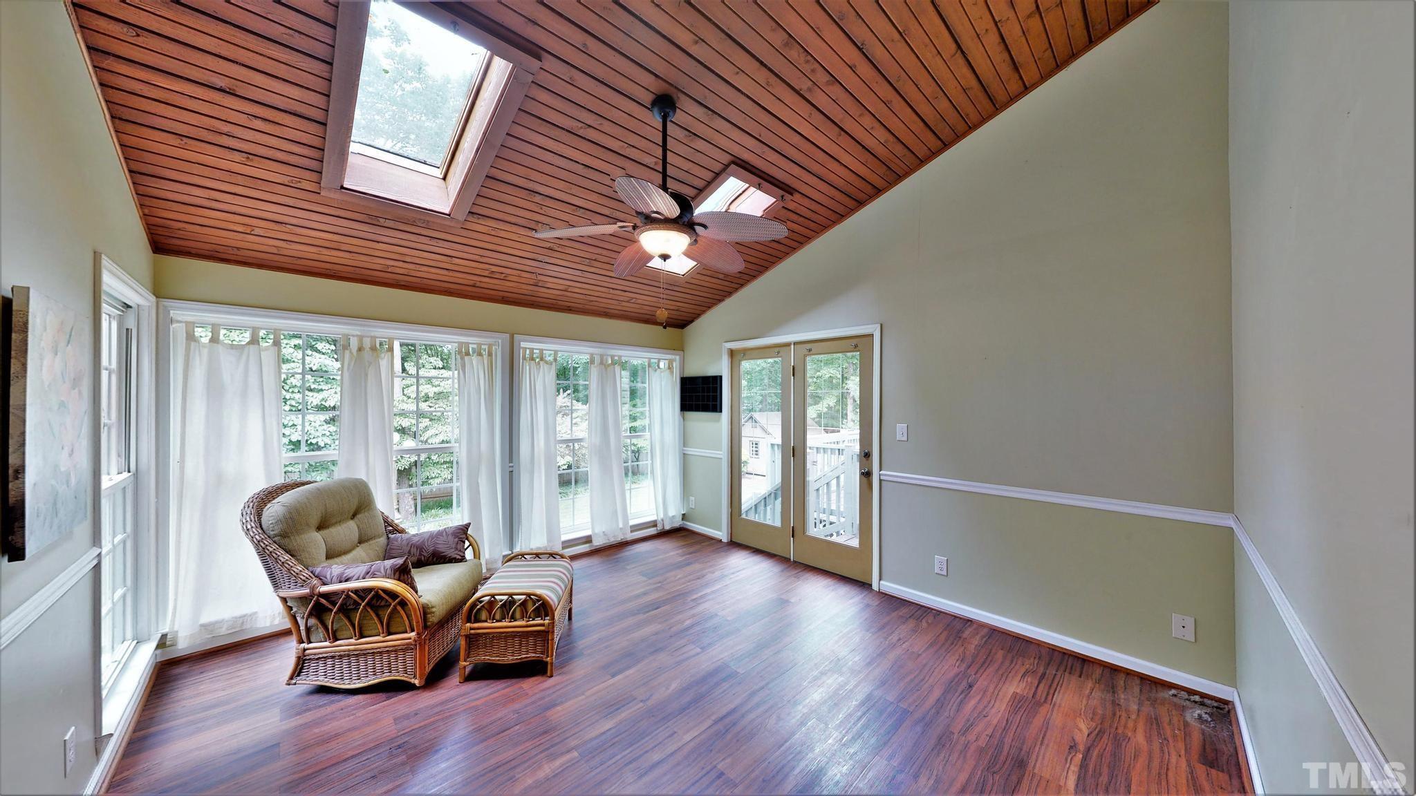 1496 Kerner Road Kernersville, NC 27284 - Photo 32 of 82 a living room with furniture and a large window