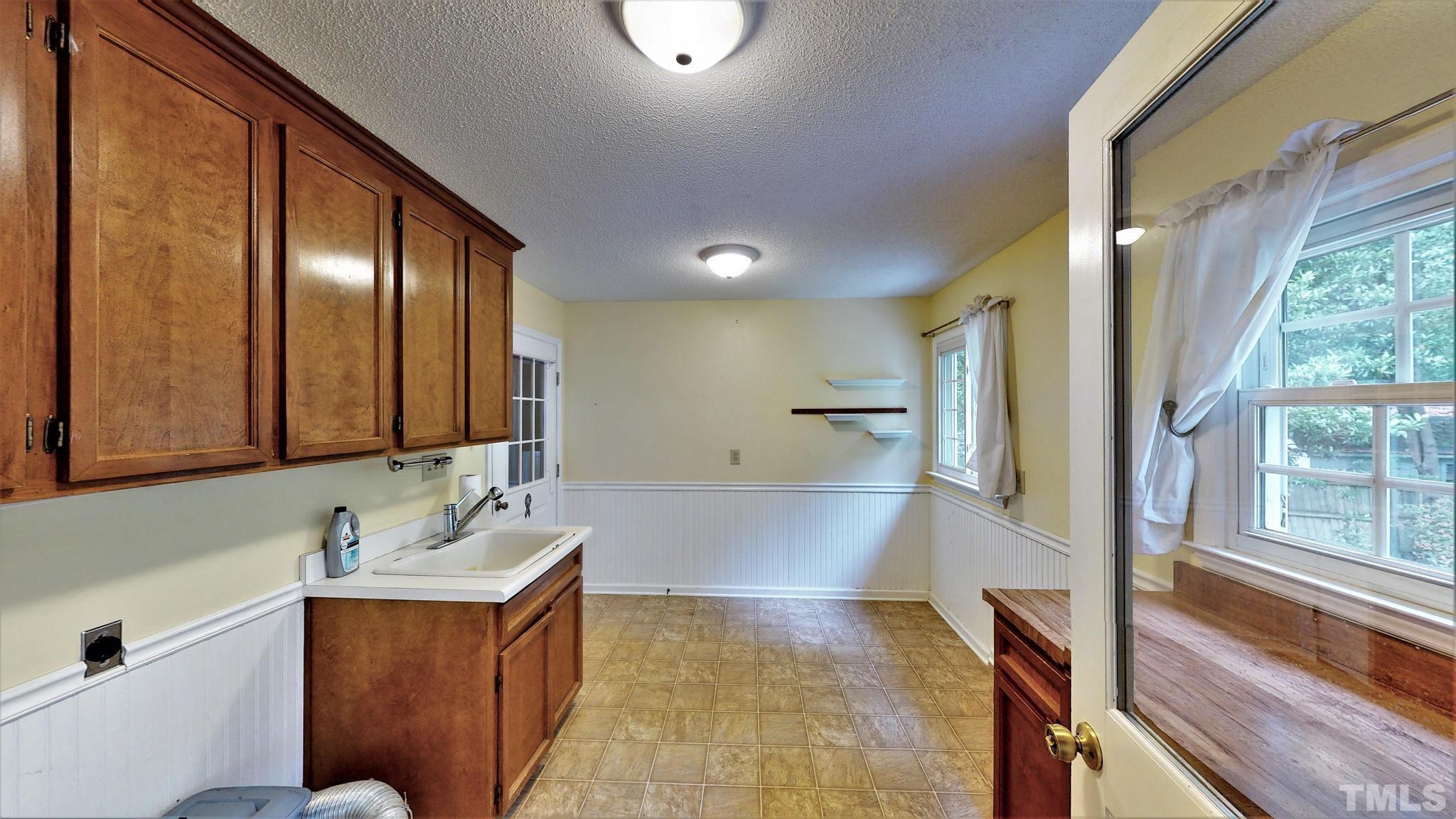 1496 Kerner Road Kernersville, NC 27284 - Photo 34 of 82 a spacious bathroom with a tub sink and mirror
