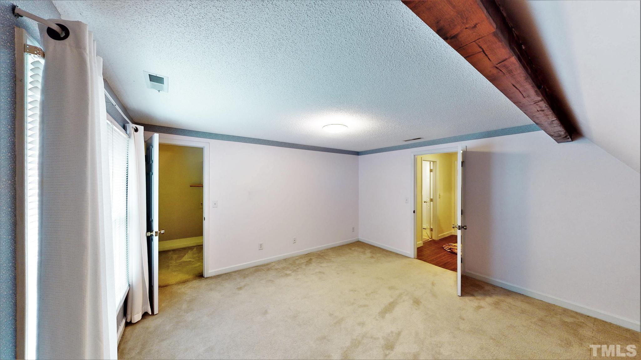 1496 Kerner Road Kernersville, NC 27284 - Photo 55 of 82 an empty room with a window and painted walls