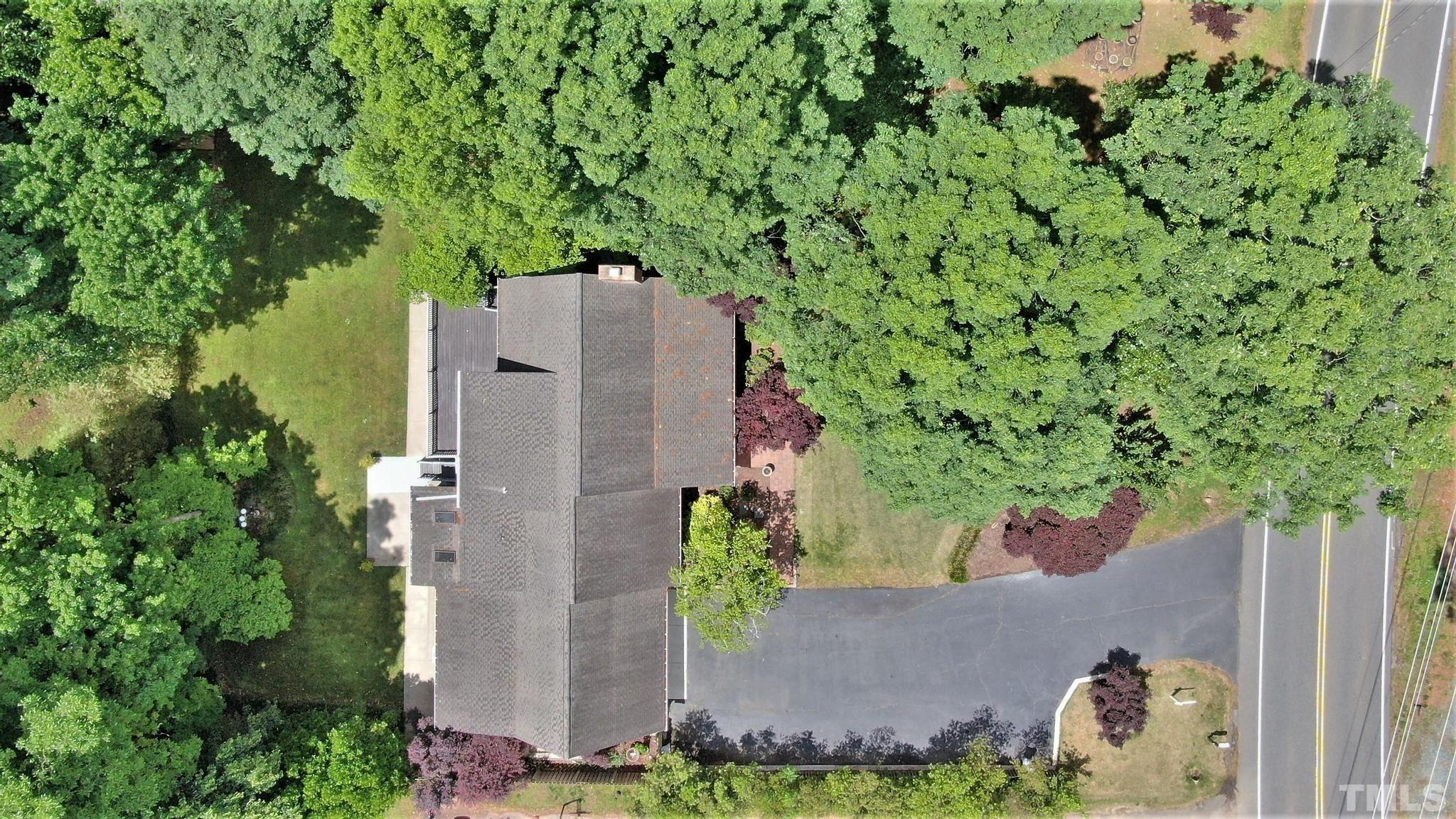 1496 Kerner Road Kernersville, NC 27284 - Photo 66 of 82 an aerial view of a house with a yard and garden
