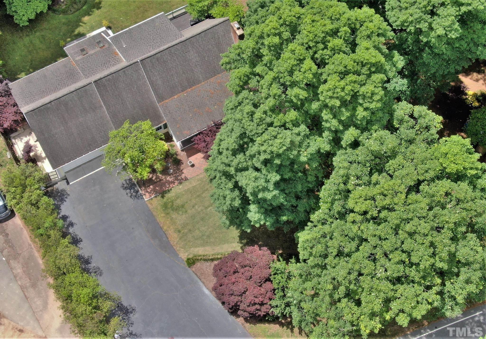 1496 Kerner Road Kernersville, NC 27284 - Photo 68 of 82 an aerial view of a house with a yard and garden