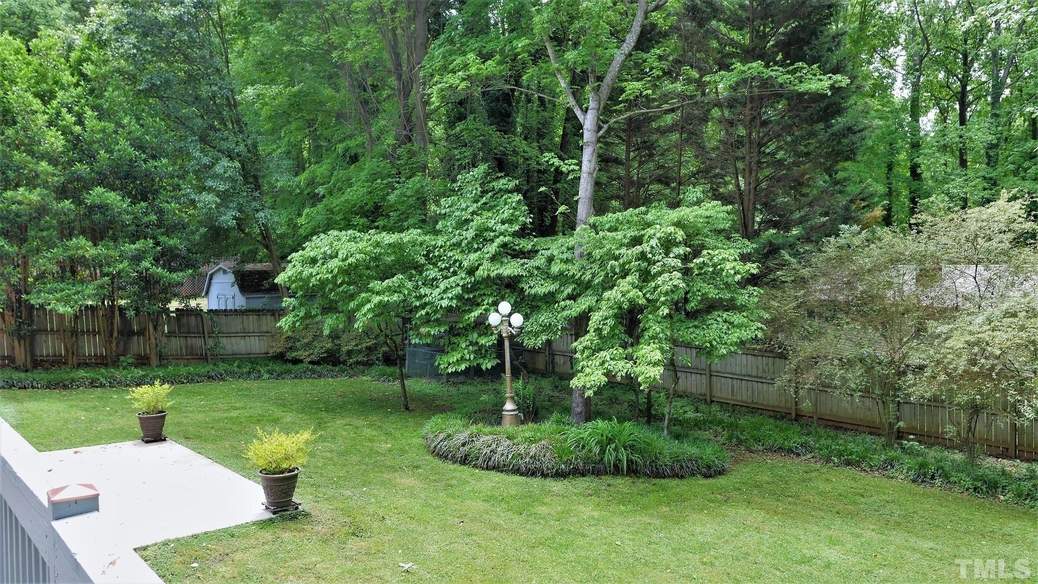 1496 Kerner Road Kernersville, NC 27284 - Photo 76 of 82 a view of a backyard with a garden